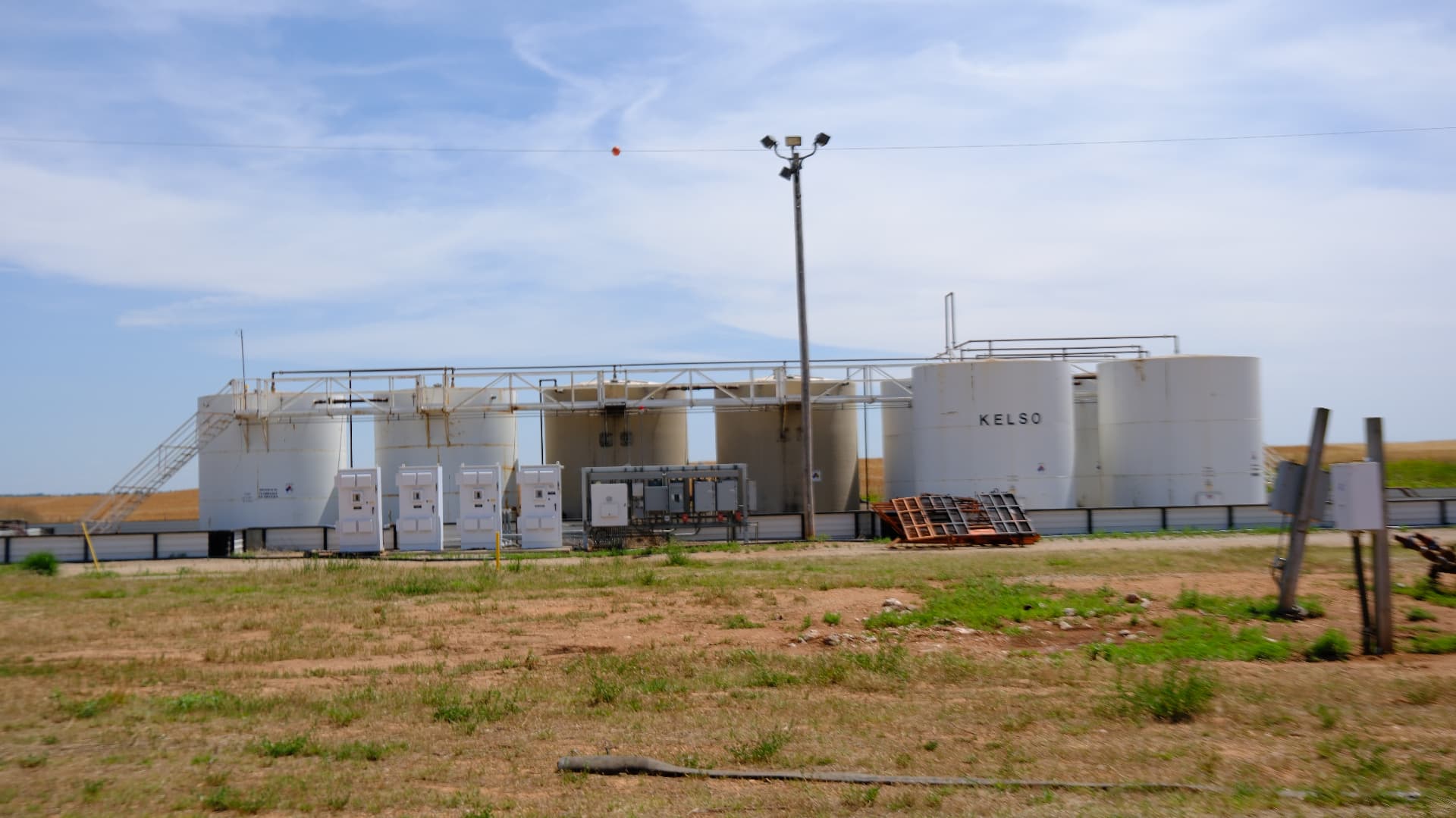Row of production tanks at a Kelso tank battery site